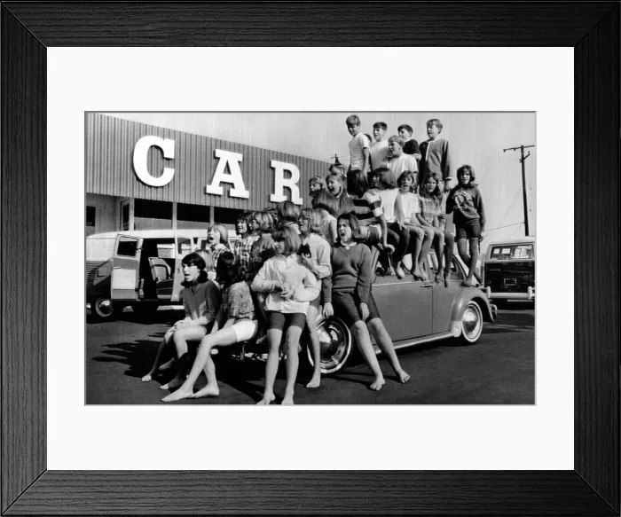 Framed Print : Teenagers would attempt to get this crowd into a Volkswagen Beetle. 31 teenagers had average weight of 100 pounds and average height of five feet