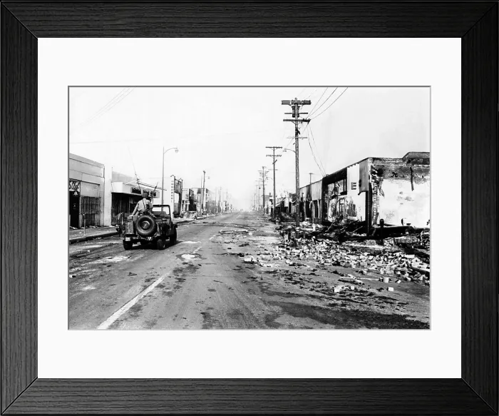 Framed Print : National Guard jeep patrols Watts section of Los Angeles. After six days of riots, almost a 1000 business were destroyed in the Nation's worst race riot in two decades