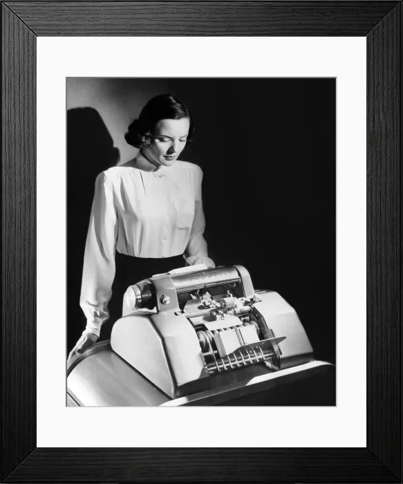Framed Print : Mechanized currency counter, the Tichometer accurately counts dollar bills at the rate of 1000 per minute