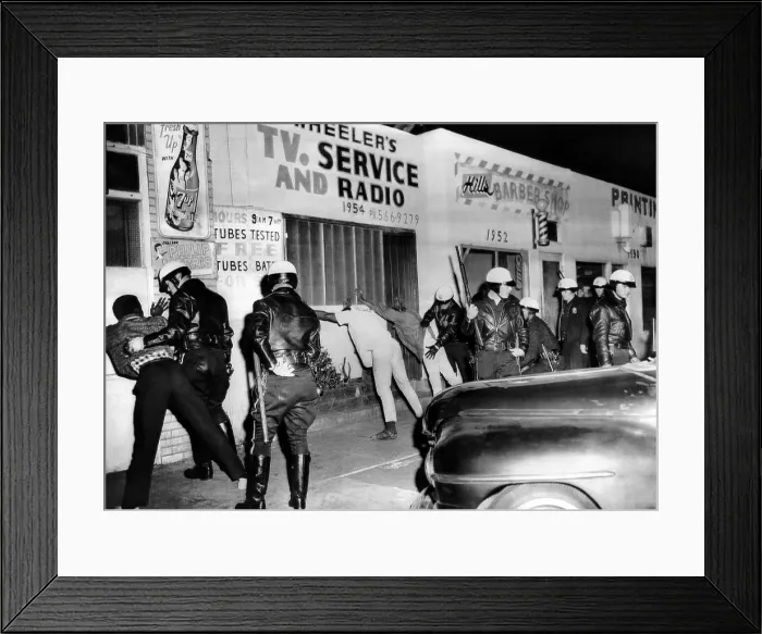 Framed Print : March 1966 Watts Riot. Police search African American youths in Watts During the second race riot in eight months Framed Print : March 1966 Watts Riot. Police search African American youths in Watts During the second race riot in eight months