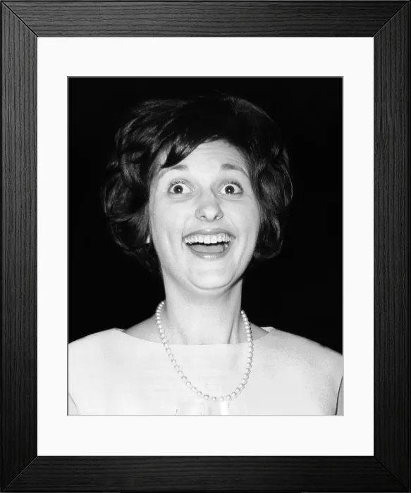 Framed Print : Lynda Bird Johnson smiles as she arrives at the Helen Hayes Theatre in New York. She attended the play, The Subject Was Roses'. August 6, 1965 Framed Print : Lynda Bird Johnson smiles as she arrives at the Helen Hayes Theatre in New York. She attended the play, The Subject Was Roses'. August 6, 1965