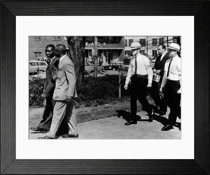 Framed Print : A Ku Klux Klan Security Patrol walk behind Jeremiah X (left in light suit), leader of Atlanta's Black Muslim sect Framed Print : A Ku Klux Klan Security Patrol walk behind Jeremiah X (left in light suit), leader of Atlanta's Black Muslim sect