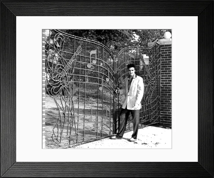 Framed Print : ELVIS PRESLEY stands in front of the gates to Graceland, 4 / 26 / 57