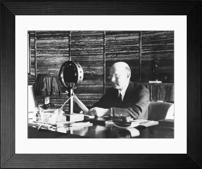Framed Print : Andre Citroen, French auto manufacturer broadcasts a message to listeners in America