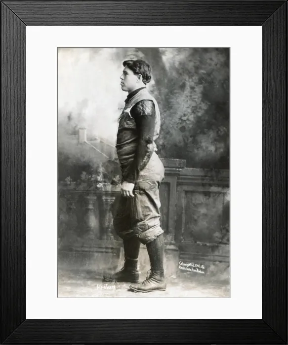 Framed Print : Willie Heston, University of Michigan's famous halfback, 1903. His uniform had a laced canvas placket, with heavy external shoulder, elbow, thigh and knee pads