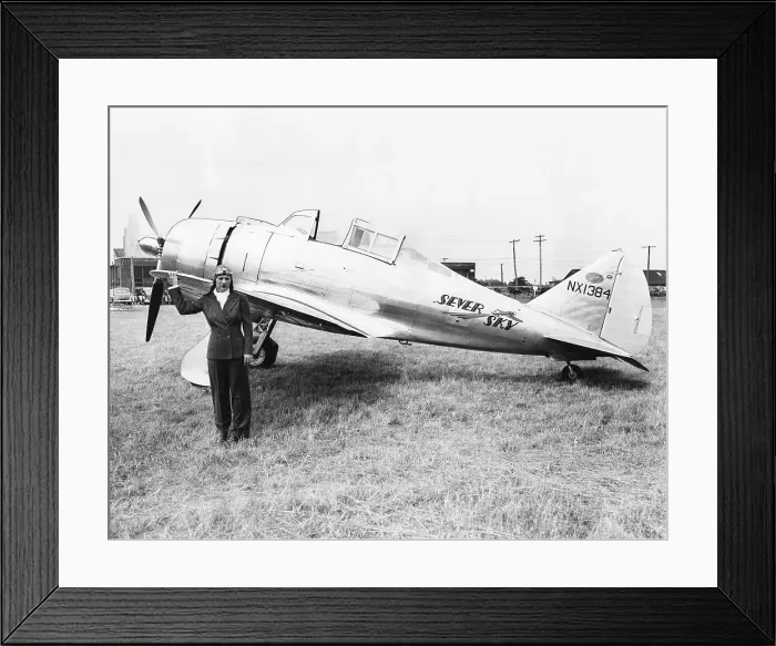 Framed Print : Jacqueline Cochran with her new speed plane. The Seversky pursuit craft has a 1, 000 Horsepower Wasp engine with 14 cylinders. Aug. 29, 1939. - (CSU_2015_5_37)