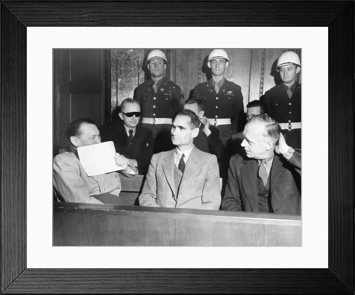 Framed Print : Nazi defendants under guard in the dock at Nuremberg War Crimes Trial, Feb. 5, 1946. L-R: Herman Goering covers his grin with a piece of paper; Adm Framed Print : Nazi defendants under guard in the dock at Nuremberg War Crimes Trial, Feb. 5, 1946. L-R: Herman Goering covers his grin with a piece of paper; Adm