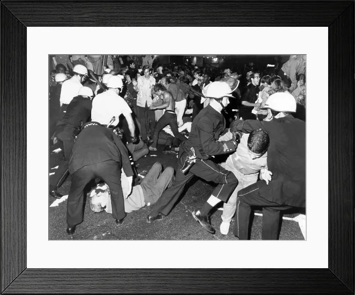 Framed Print : Police move against anti-Vietnam War protesters. They were near the Conrad Hilton Hotel on Chicago's Michigan Avenue du ring the Democratic National Convention. Aug. 28, 1968 Framed Print : Police move against anti-Vietnam War protesters. They were near the Conrad Hilton Hotel on Chicago's Michigan Avenue du ring the Democratic National Convention. Aug. 28, 1968