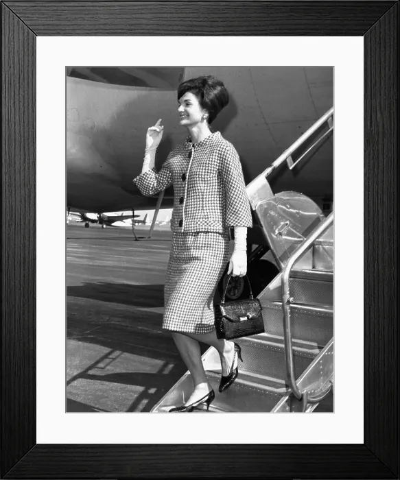 Framed Print : Jacqueline Kennedy deplanes in New York City. She would receive a citation for her contribution to culture and the arts from New York University's Institute of Fine Arts. Oct