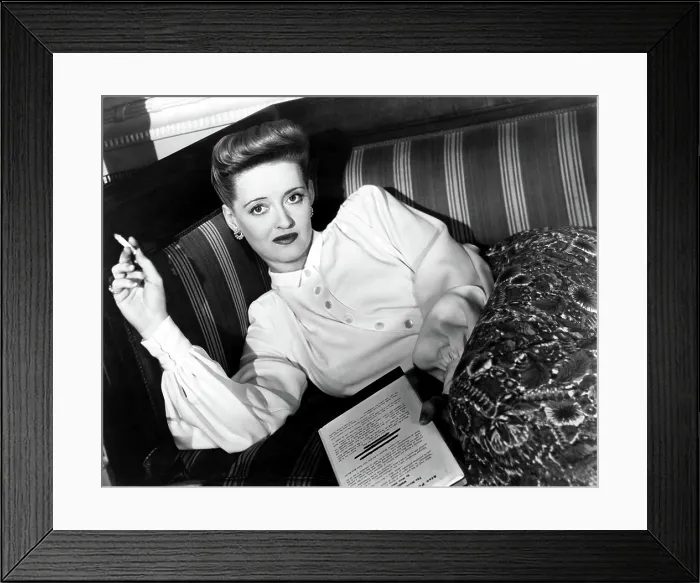 Framed Print : Bette Davis in publicity pose for NOW, VOYAGER, 1942 Framed Print : Bette Davis in publicity pose for NOW, VOYAGER, 1942