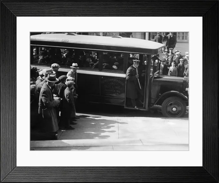 Framed Print : Sacco and Vanzetti taken to court on a bus of the Oakdale Community Garage and Busline. An armed officer stands in the bus door. April 9, 1927 - (CSU_2015_5_104) Framed Print : Sacco and Vanzetti taken to court on a bus of the Oakdale Community Garage and Busline. An armed officer stands in the bus door. April 9, 1927 - (CSU_2015_5_104)