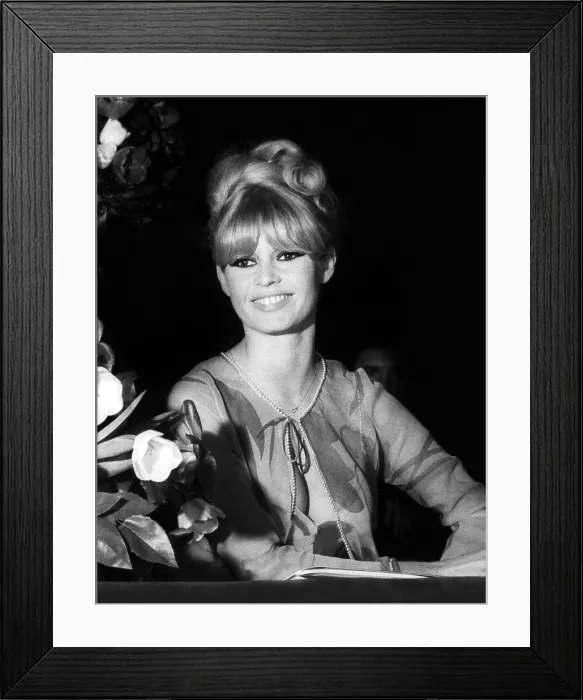 Framed Print : Brigitte Bardot smiles from a box at the Opera National Theater, Paris. April 12, 1966. She was attending the 36th annual gala of the Artists Union. - (CSU_2015_6_232)