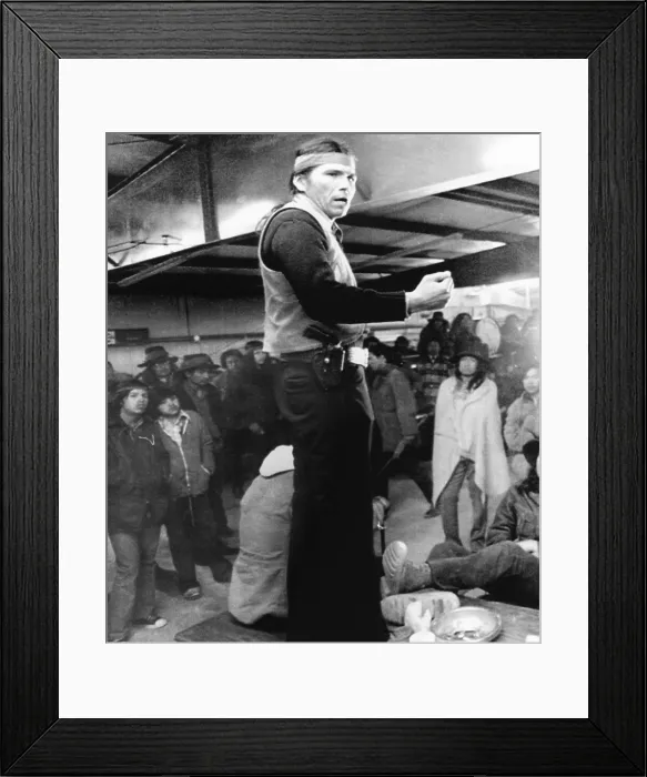 Framed Print : Dennis Banks, speaks to the Indians during the occupation Wounded Knee in 1973. About 200 Native Americans were protesting the tribal presidency of Richard Wilson. March 9, 1973 Framed Print : Dennis Banks, speaks to the Indians during the occupation Wounded Knee in 1973. About 200 Native Americans were protesting the tribal presidency of Richard Wilson. March 9, 1973