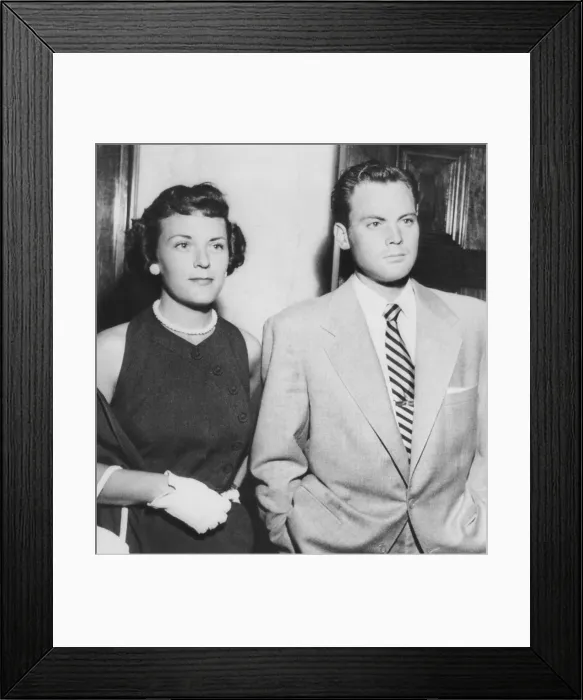 Framed Print : Actor John Agar in court on July 20, 1950 to face to drunk driving charges. With him is his wife Loretta Barnett Combs Agar. (CSU_2015_11_1178) Framed Print : Actor John Agar in court on July 20, 1950 to face to drunk driving charges. With him is his wife Loretta Barnett Combs Agar. (CSU_2015_11_1178)