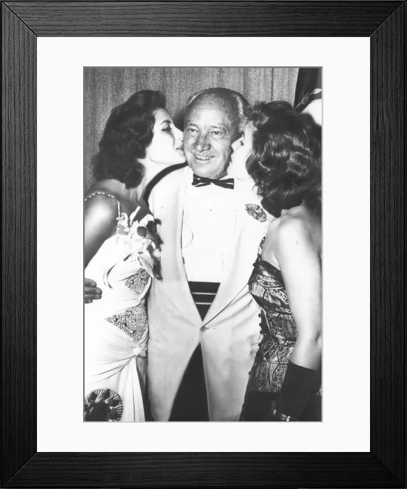 Framed Print : Conrad Hilton is kissed by Miss Universe Gladys Zender (left) and the runner up. July 22, 1957 Framed Print : Conrad Hilton is kissed by Miss Universe Gladys Zender (left) and the runner up. July 22, 1957