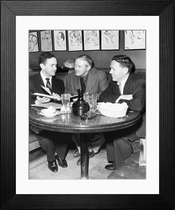 Framed Print : Radio script writers, Jerry Lawrence (left), and Bob Lee (right), with James Hilton (center). May 27, 1952. They were collaborating on a script based on the 19th c Framed Print : Radio script writers, Jerry Lawrence (left), and Bob Lee (right), with James Hilton (center). May 27, 1952. They were collaborating on a script based on the 19th c