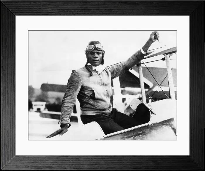Framed Print : Hubert Julian at Abridge Aerodrome, in Essex, England. Aug. 30, 1934. He announced plans to enter London-Melbourne air race as a representative of Abyssinia, but did not