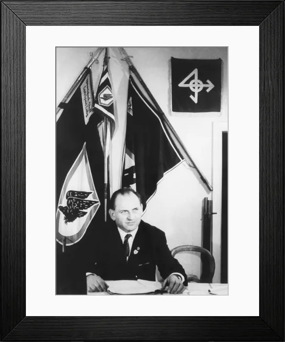 Framed Print : Horst Promnitz, leader of the Eagles, a youth movement with strong ties to Nazi past. In April 1966, he sat at his desk in an old World War II bunker in Lubeck