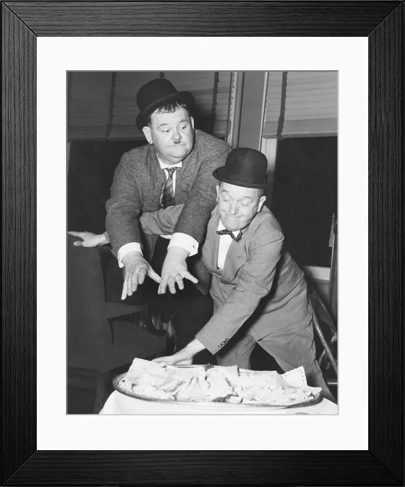 Framed Print : From left: Oliver Hardy, Stan Laurel, backstage at the Earle Theatre where they are appearing, Philadelphia, PA, December 3, 1940