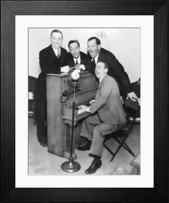 Framed Print : Clockwise from left: Stan Laurel, Buster Keaton, Oliver Hardy, Jimmy Durante, on the MGM lot, early 1930s Framed Print : Clockwise from left: Stan Laurel, Buster Keaton, Oliver Hardy, Jimmy Durante, on the MGM lot, early 1930s