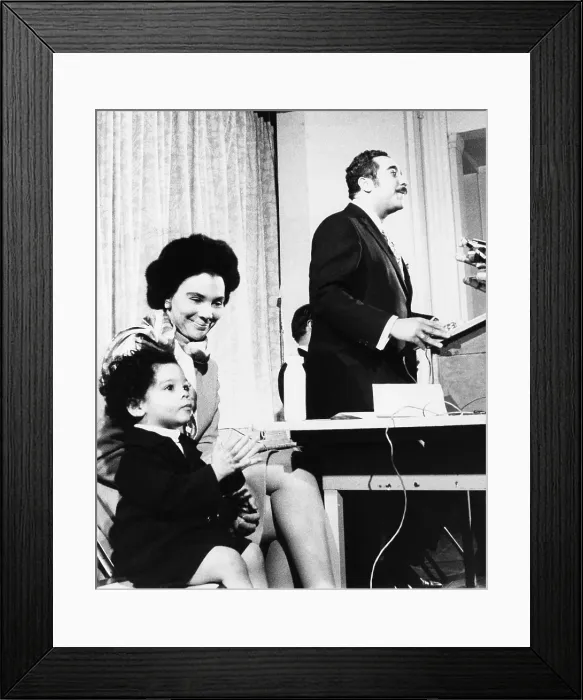 Framed Print : Harlem assemblyman Charles Rangel announcing he would oppose Rep. Adam Clayton Powell in primary. At right is his wife, Alma Rangel, and son Steven