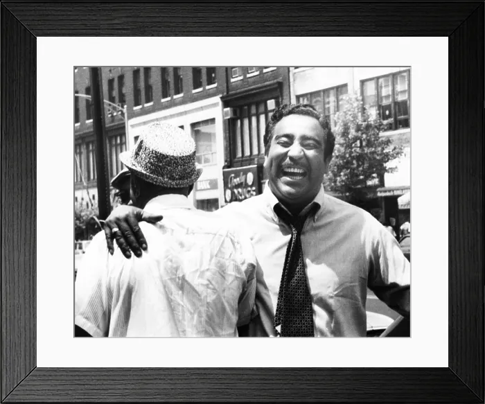 Framed Print : Charles Rangel, hugging a supporter after he won in the Democratic primary Framed Print : Charles Rangel, hugging a supporter after he won in the Democratic primary