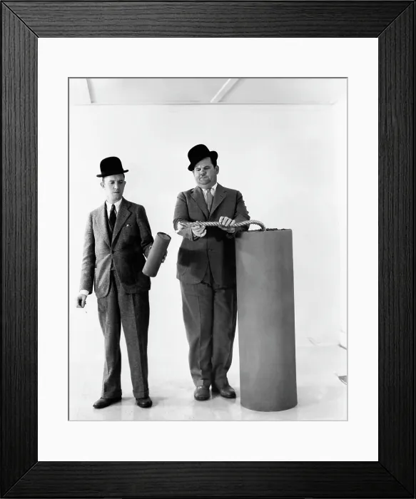 Framed Print : From left, Stan Laurel, Oliver Hardy, celebrating the Fourth of July, ca. 1930s Framed Print : From left, Stan Laurel, Oliver Hardy, celebrating the Fourth of July, ca. 1930s