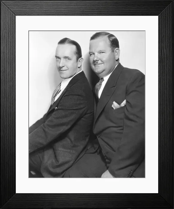 Framed Print : From left: Stan Laurel, Oliver Hardy, MGM publicity shot, 1930s