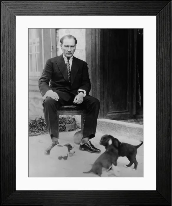Framed Print : Mustafa Kemal Ataturk, President of Turkey, with his pet dogs, ca. 1930 Framed Print : Mustafa Kemal Ataturk, President of Turkey, with his pet dogs, ca. 1930