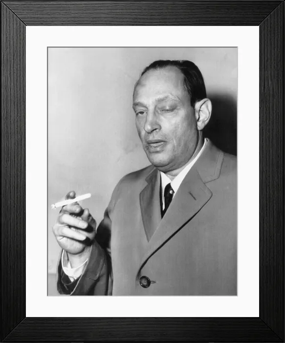 Framed Print : Paroled murdered, Nathan Leopold smokes a cigarette at Idlewild (JFK) Airport, March 15, 1958 Framed Print : Paroled murdered, Nathan Leopold smokes a cigarette at Idlewild (JFK) Airport, March 15, 1958