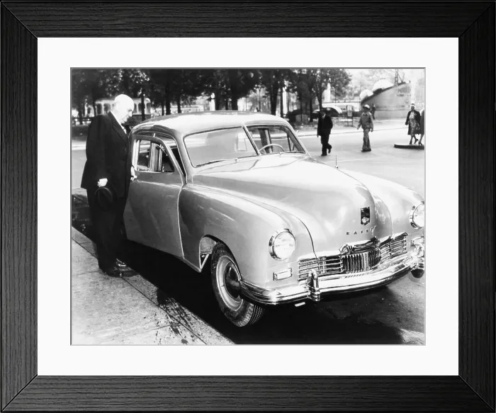 Framed Print : Henry Kaiser opens the door of the first Kaiser Special to come off assembly-line, May 31, 1946. Kaiser Motors produced cars until 1955. (CSU_2015_8_656)