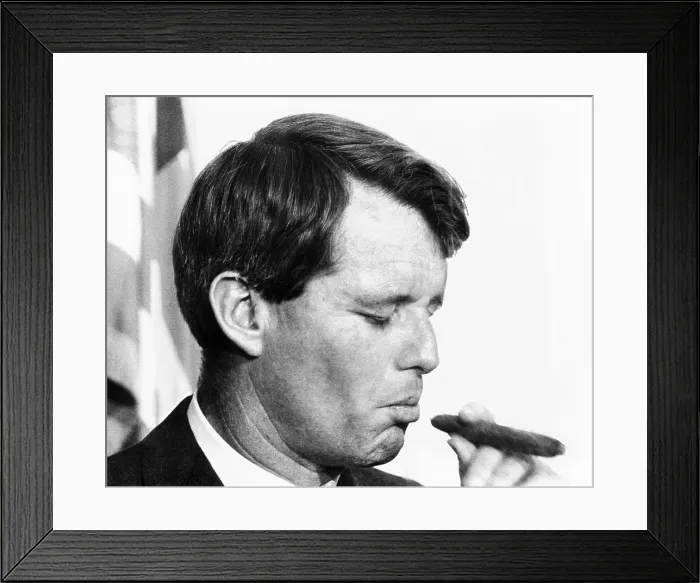 Framed Print : Senator Robert Kennedy eyes a cigar. He was attending a luncheon in honor of former Presidential aide, Bill Moyers. Feb. 17, 1967. (CSU_ALPHA_1040) CSU Archives / Everett Collection Framed Print : Senator Robert Kennedy eyes a cigar. He was attending a luncheon in honor of former Presidential aide, Bill Moyers. Feb. 17, 1967. (CSU_ALPHA_1040) CSU Archives / Everett Collection