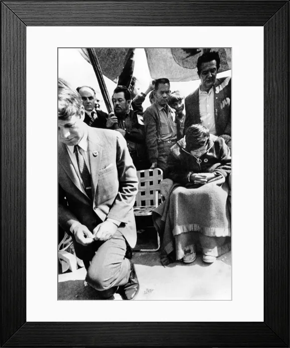 Framed Print : Sen. Robert Kennedy worships with Cesar Chavez. Chavez (right), the leader of the United Farm Workers union, had just ended a 23 day fast for non-violence. Mar. 10, 1968