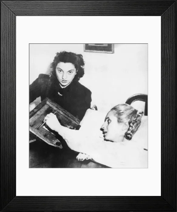 Framed Print : Eva Peron, wife of President of Argentina Juan Peron, votes from her hospital bed on Nov. 11, 1951 Framed Print : Eva Peron, wife of President of Argentina Juan Peron, votes from her hospital bed on Nov. 11, 1951
