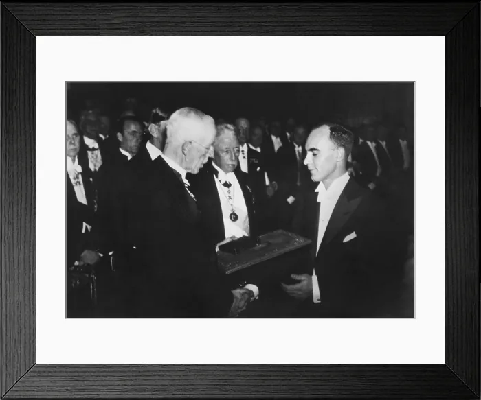 Framed Print : Dr. Carl Anderson, received the 1931 Nobel Prize in Physics from King Gustav of Sweden. Dec. 25, 1936