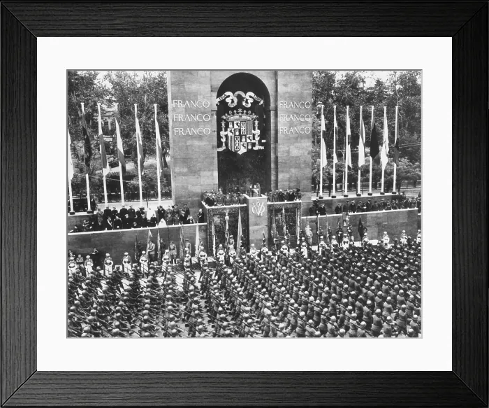 Framed Print : Francisco Franco salutes Italian troops marching in his huge victory parade in Madrid. May 27, 1939 Framed Print : Francisco Franco salutes Italian troops marching in his huge victory parade in Madrid. May 27, 1939