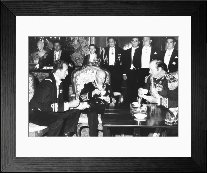 Framed Print : Spanish dictator Francisco Franco (center), hosts Prince Juan Carlos and Gen. Alfredo Stroessner. July 20, 1953