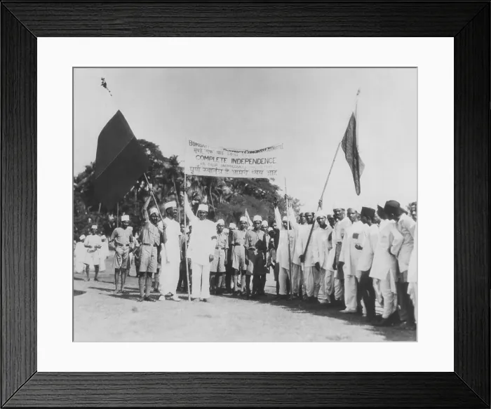 Framed Print : Satyagrahi volunteers in Bombay (Mumbai) salute the National Congress flag. India, May 1930