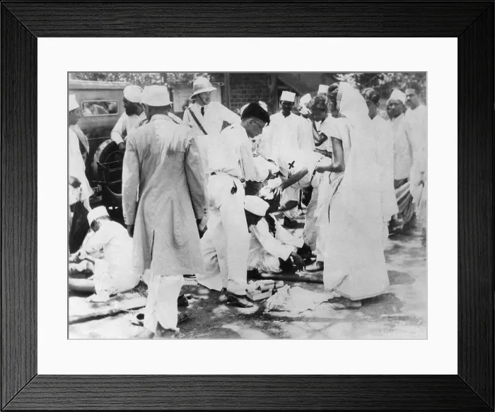 Framed Print : Gandhi followers continued their raids on salt works after Gandhi's imprisonment. June 1930