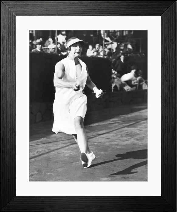 Framed Print : Helen Wills Moody playing against Manual Alonzo at the Westside Tennis Club at Forest Hills. May 18, 1933. Wills Moody often practiced against men. (CSU_2015_11_1582) Framed Print : Helen Wills Moody playing against Manual Alonzo at the Westside Tennis Club at Forest Hills. May 18, 1933. Wills Moody often practiced against men. (CSU_2015_11_1582)