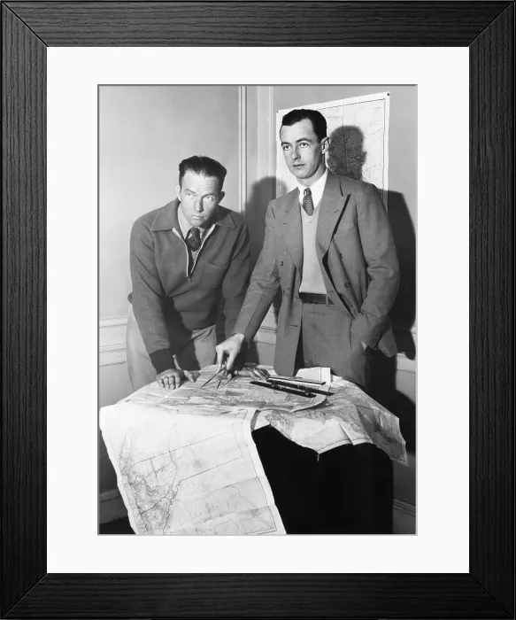 Framed Print : Hugh Herndon Jr. (right) and Clyde Panborn, co-pilots and co-aviators, planning an 11 day flight. In New York City, March 18, 1931