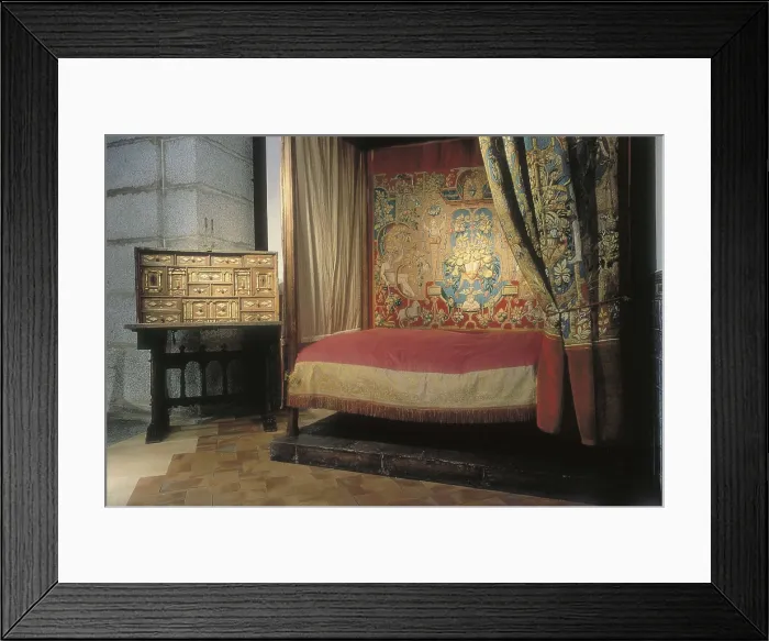 Framed Print : PHILIP II of Spain (1527-1598). Philip II's room in the Palace of the Bourbons in El Escorial. Bed of Brussels and bureau. SPAIN. MADRID (AUTONOMOUS COMMUNITY)