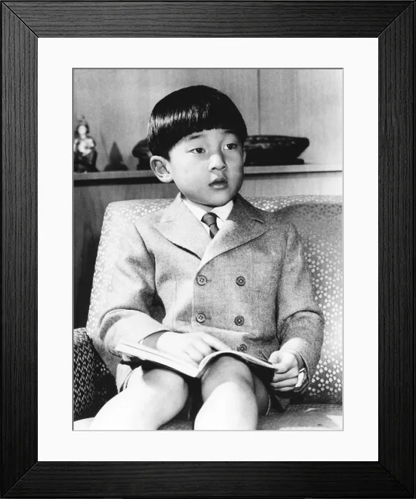 Framed Print : Japan's young Prince Hiro at age 7, Feb. 23, 1967. The first son of Crown Prince Akihito and Princess Michiko reads a book in his room at Togu Palace. (CSU_2015_9_865) Framed Print : Japan's young Prince Hiro at age 7, Feb. 23, 1967. The first son of Crown Prince Akihito and Princess Michiko reads a book in his room at Togu Palace. (CSU_2015_9_865)