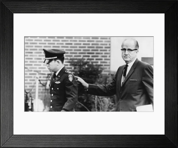 Framed Print : Lt. William Calley leaves a military court with his chief civilian attorney, George Latimer. Nov. 12, 1970