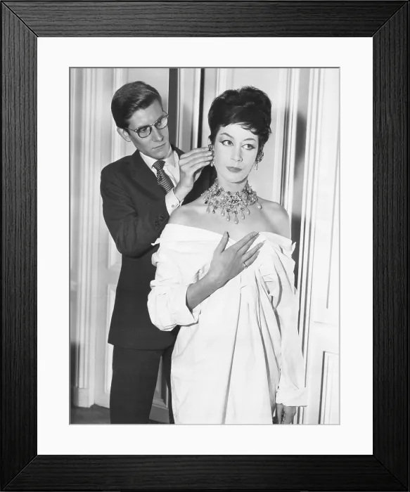 Framed Print : French fashion designer Yves Saint Laurent putting earing on model. Jan. 18, 1962. (CSU_2015_7_380) Framed Print : French fashion designer Yves Saint Laurent putting earing on model. Jan. 18, 1962. (CSU_2015_7_380)