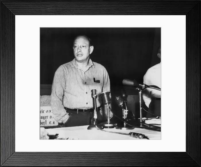 Framed Print : Nathan Leopold, 52 year old, speaks to the press at Statesville Penitentiary, July 31, 1957. The famous murderer had just been refused executive clemency by Gov. William Stratton