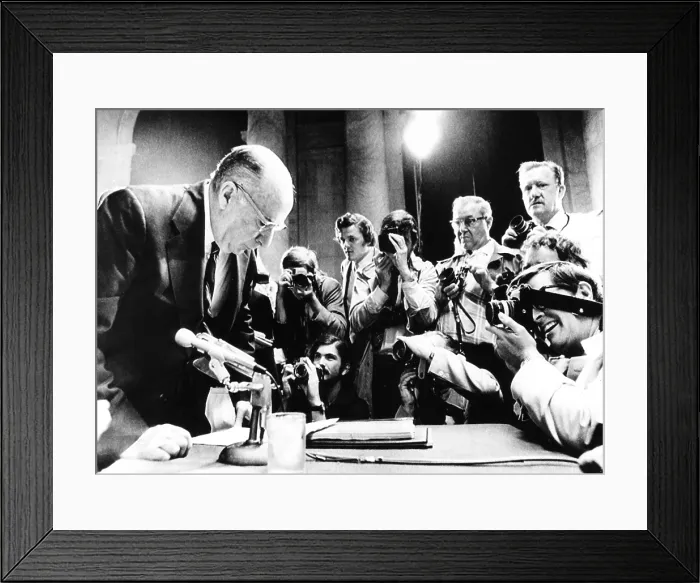 Framed Print : Former Atty. Gen. John Mitchell surrounded by photographers at Watergate hearings. July 10, 1973