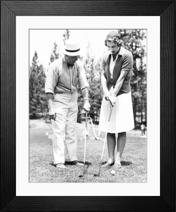 Framed Print : Helen Wills Moody brushed up on her golf game with Tom Nicholl, in Glenbrook, Nevada. July 24, 1937 Framed Print : Helen Wills Moody brushed up on her golf game with Tom Nicholl, in Glenbrook, Nevada. July 24, 1937