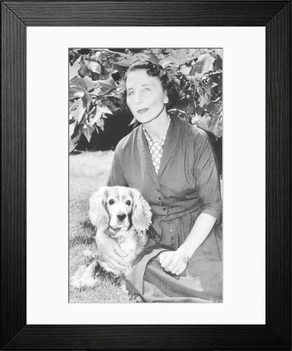 Framed Print : Helen Wills Moody Roark and her dog Docky at her Los Angeles home in August 1958