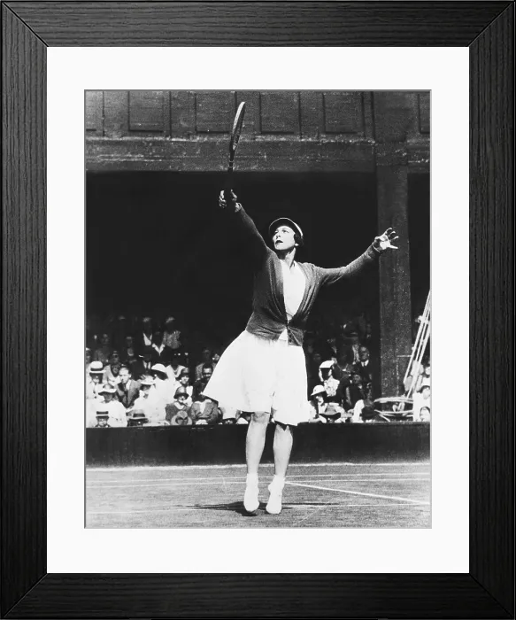 Framed Print : Helen Wills Moody returning a high one during her match with Mrs. J.P. Macready of England. July 4, 1933 Framed Print : Helen Wills Moody returning a high one during her match with Mrs. J.P. Macready of England. July 4, 1933